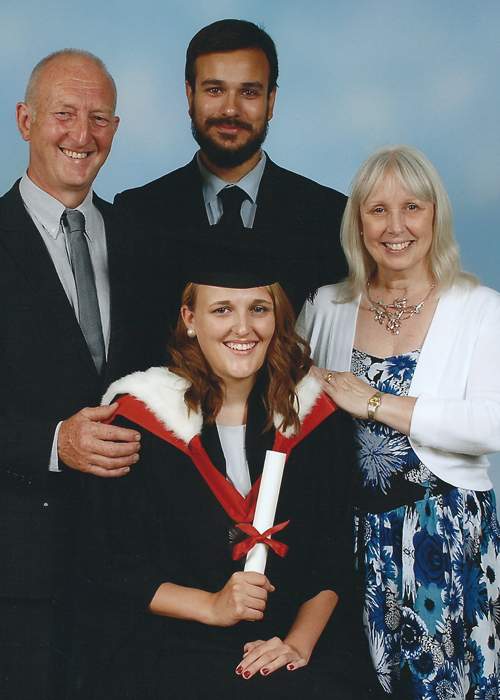 Alex Ward, with her parents and partner, graduating from medicine