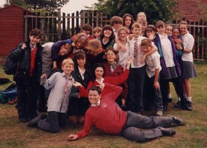 Philip Smith, kneeling bottom left, at secondary school in Rochdale