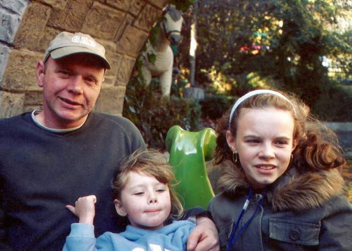 Sarah Bowers, right, with her father and younger sister in Glasgow