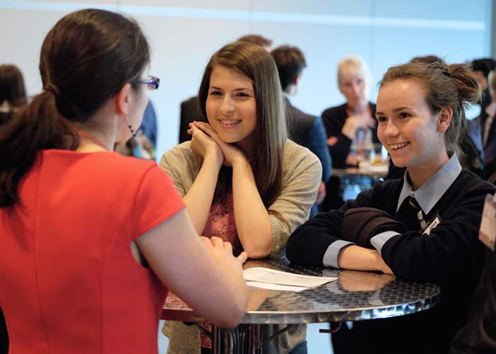 Secondary school students talk to doctors at the BMA&#39;s mentoring event