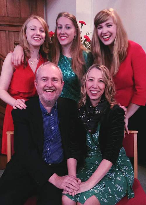 Melody, top left, with her sisters and parents at Christmas